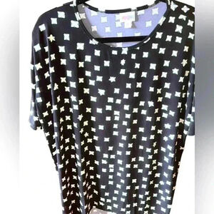 Lularoe Black & White cross‎ pattern Irma tunic top. NWT. Turquoise accent .